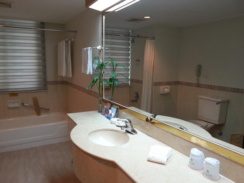 Guoxi Hotel Sanya Værelse billede