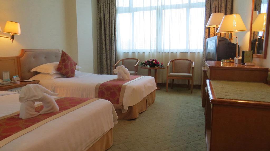 Guoxi Hotel Sanya Værelse billede